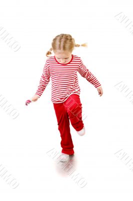 girl with lollipop jumping