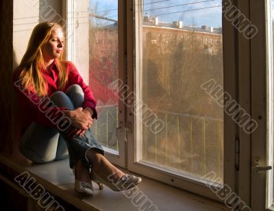 Woman near window