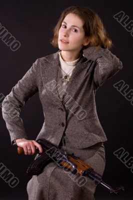 businesswoman with submachine gun