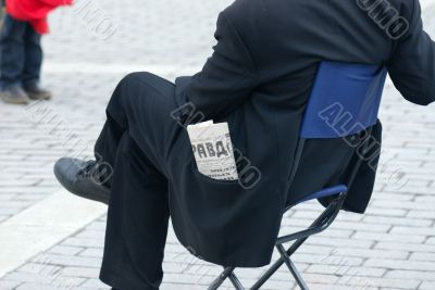 Man with newspaper