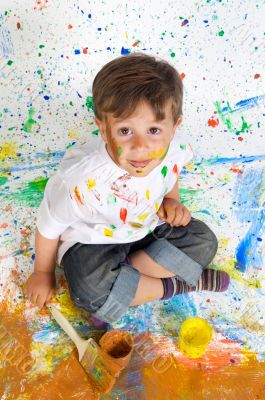 Boy playing with painting