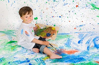 Boy playing with painting