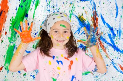 Girl playing with painting