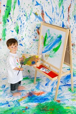 Boy playing with painting