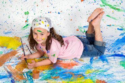 Girl playing with painting