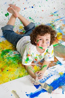 Boy playing with painting