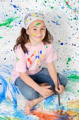 Girl playing with painting
