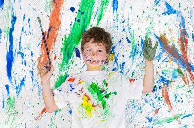 Boy playing with painting