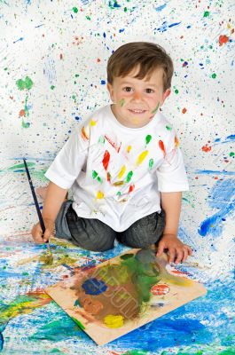 Boy playing with painting