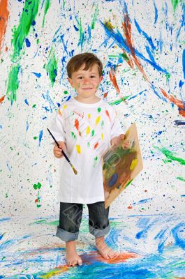 Boy playing with painting