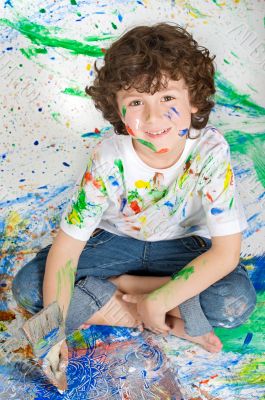 Boy playing with painting