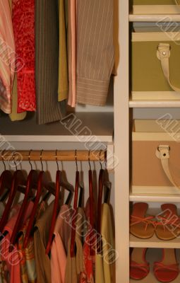 neatly organized womens closet
