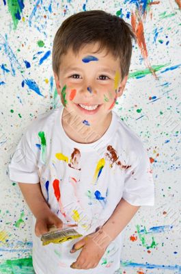 Boy playing with painting