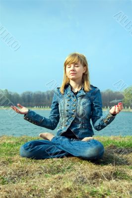 The young woman meditates.