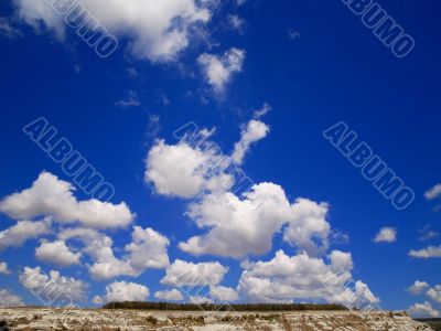 white clouds blue  sky sun