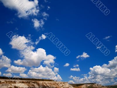  white clouds blue sky sun