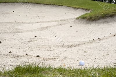 golf ball in the sandbank