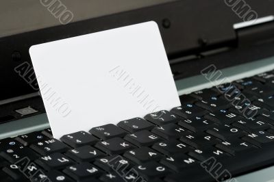 credit card standing in keyboard