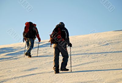 Two climbers hiking.
