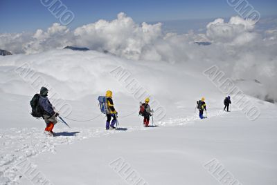 Five  climbers trekking down