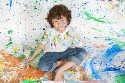Boy playing with painting