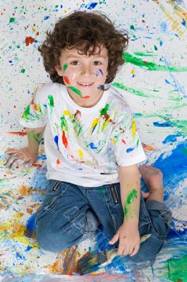 Boy playing with painting