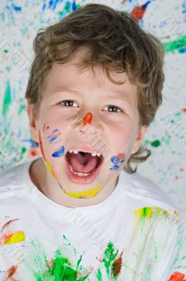 Boy playing with painting