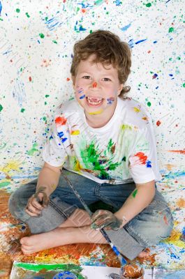 Boy playing with painting
