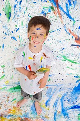 Boy playing with painting