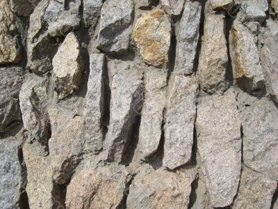 Wall from the stones fastened by cement