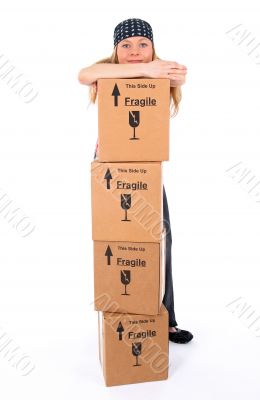 Girl with a stack of cardboard boxes