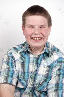 young boy laughing out loud