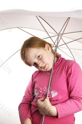 little girl holding a white umbrella