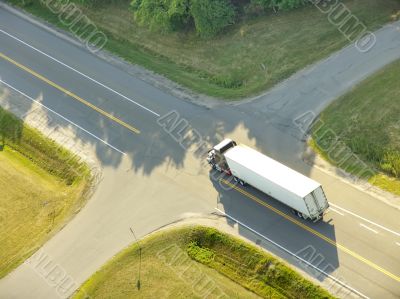 TRUCK AT CROSSROADS