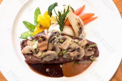 Grilled Beef Steaks with Mushrooms