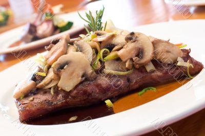 Grilled Beef Steaks with Mushrooms