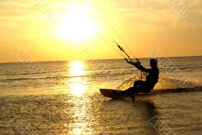 Kitesurfing and sunset