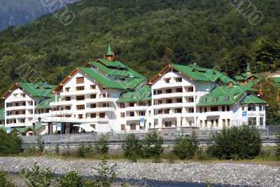 White house with green roof