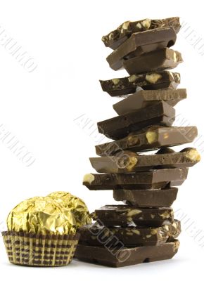 chocolate pyramid and two gold balls