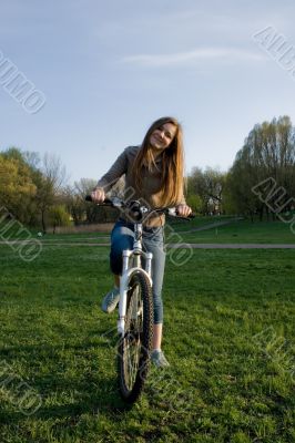 smiling girl on bike