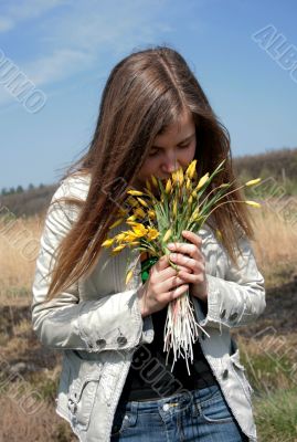 smelling flowers
