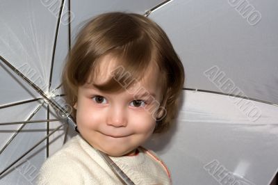 Girl with sunshade and naughty glance