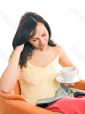 young woman enjoying a cup of tea