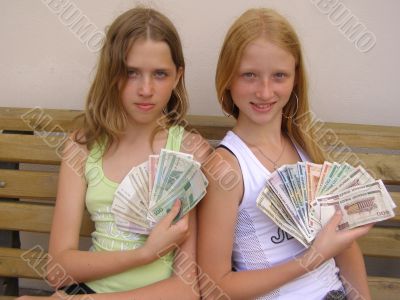 Two girls with the Byelorussian money