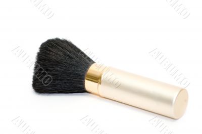 Gold makeup brush isolated