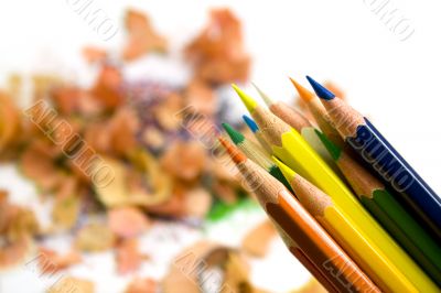 pensils over sawdust background