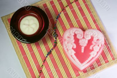 Pink soap with candle