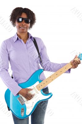 Woman playing an electric guitar