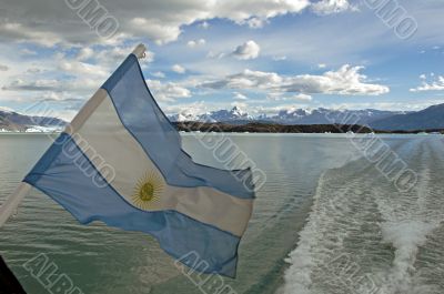 Argentina Flag, lake Argentino and mountains