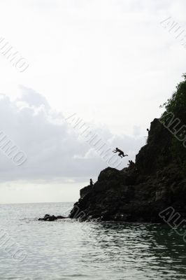 Jumping Off Rock Silhouette